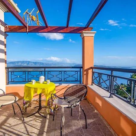 Kouloura Harbour View By *