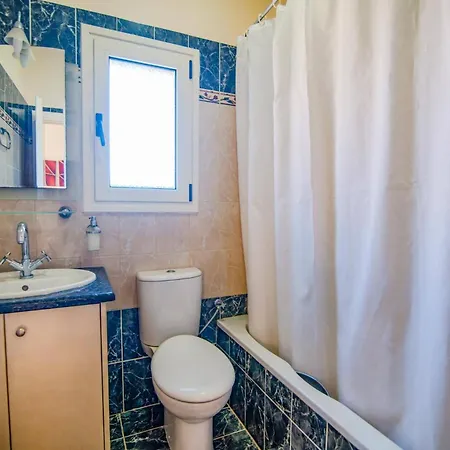 Kouloura Harbour View By *